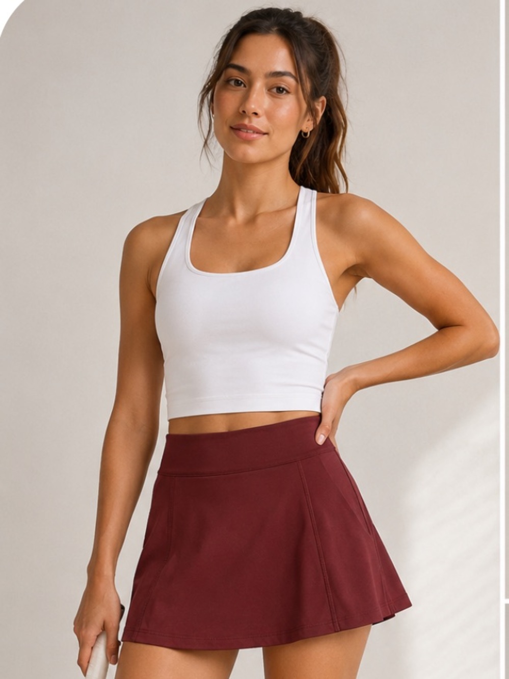 Aritzia TNA Action Powersculpt Micro Tennis Skirt in Rich Berry